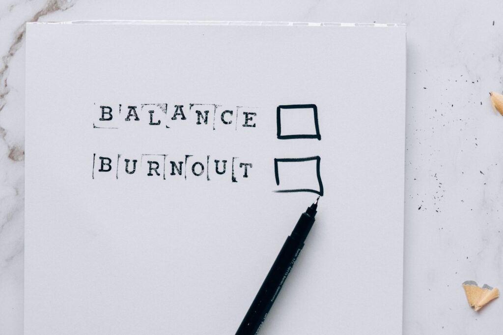 Balance or burnout checklist on paper