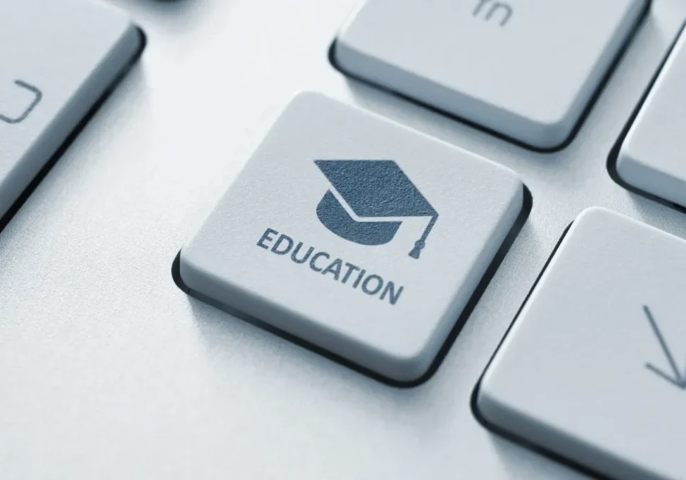 A keyboard key labeled 'Education' with a graduation cap icon.