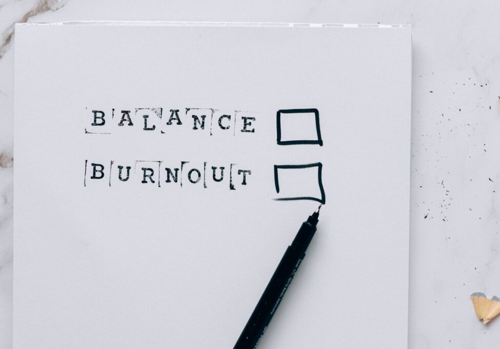 Balance or burnout checklist on paper