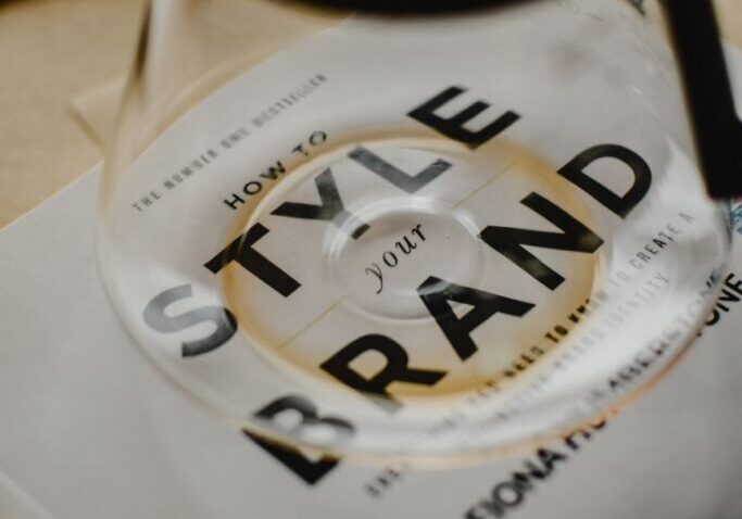 Glass carafe on "Style Your Brand" book