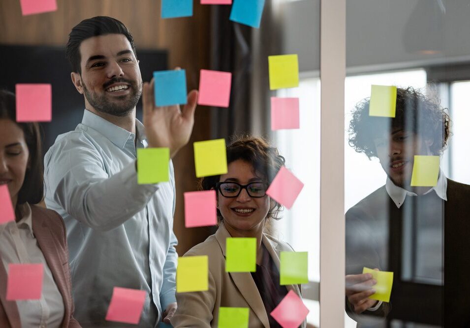Team brainstorming with colorful sticky notes